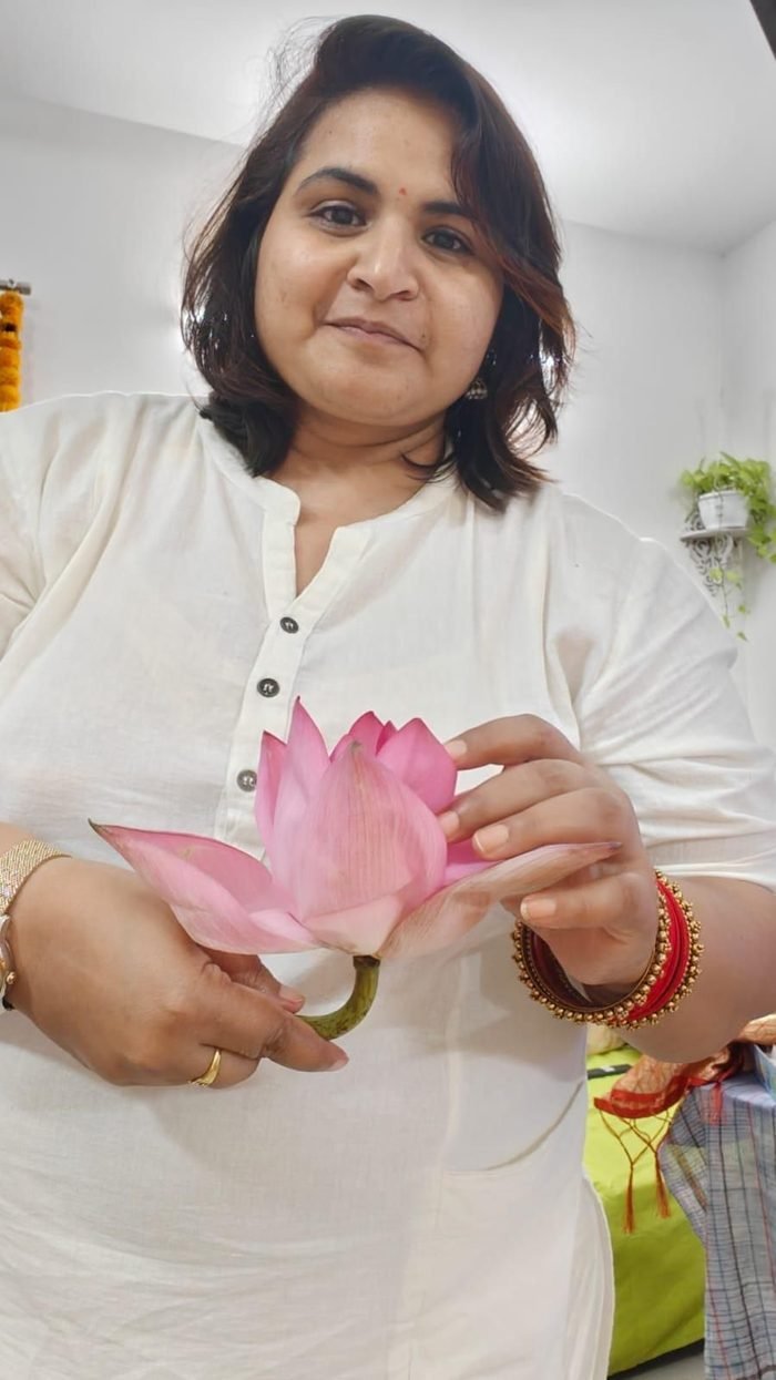 Neha Singla holding a lotus