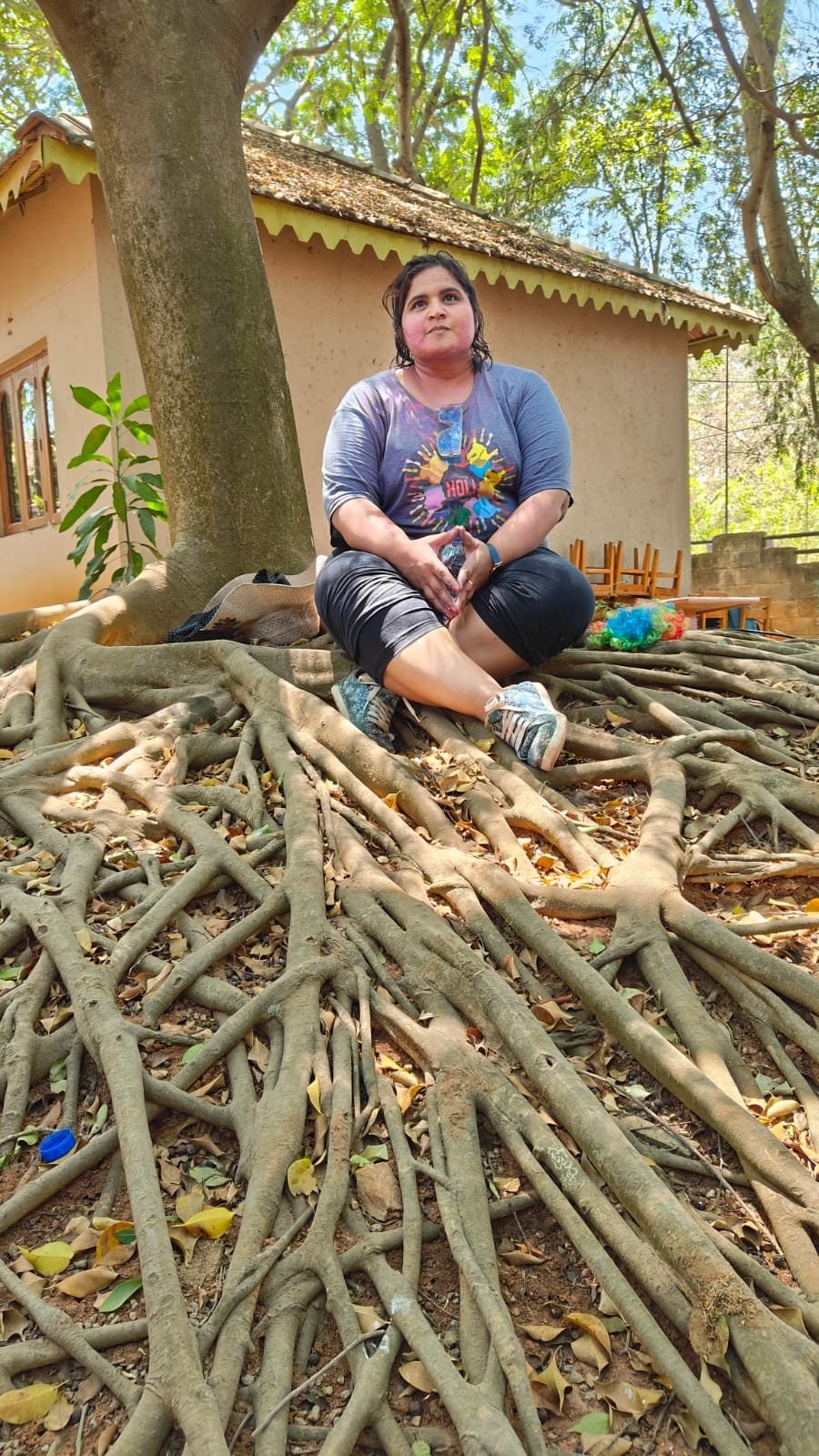 Neha Singla among tree roots
